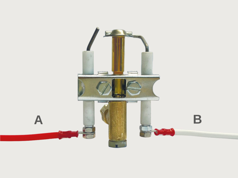 Diagram showing Electronic Pilot Assembly for a gas fireplace. Letter A shows Red (Spark) HT Lead, Letter B shows White (flame) HT Lead